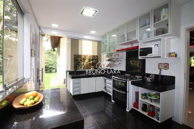 Imagem Casa à venda em Mário Campos Condomínio Serra dos Bandeirantes