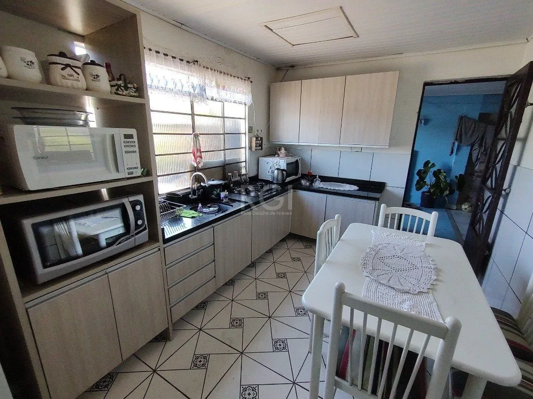 Imagem Casa para Venda - 100m², 3 dormitórios, 2 vagas - Lomba do Pinheiro