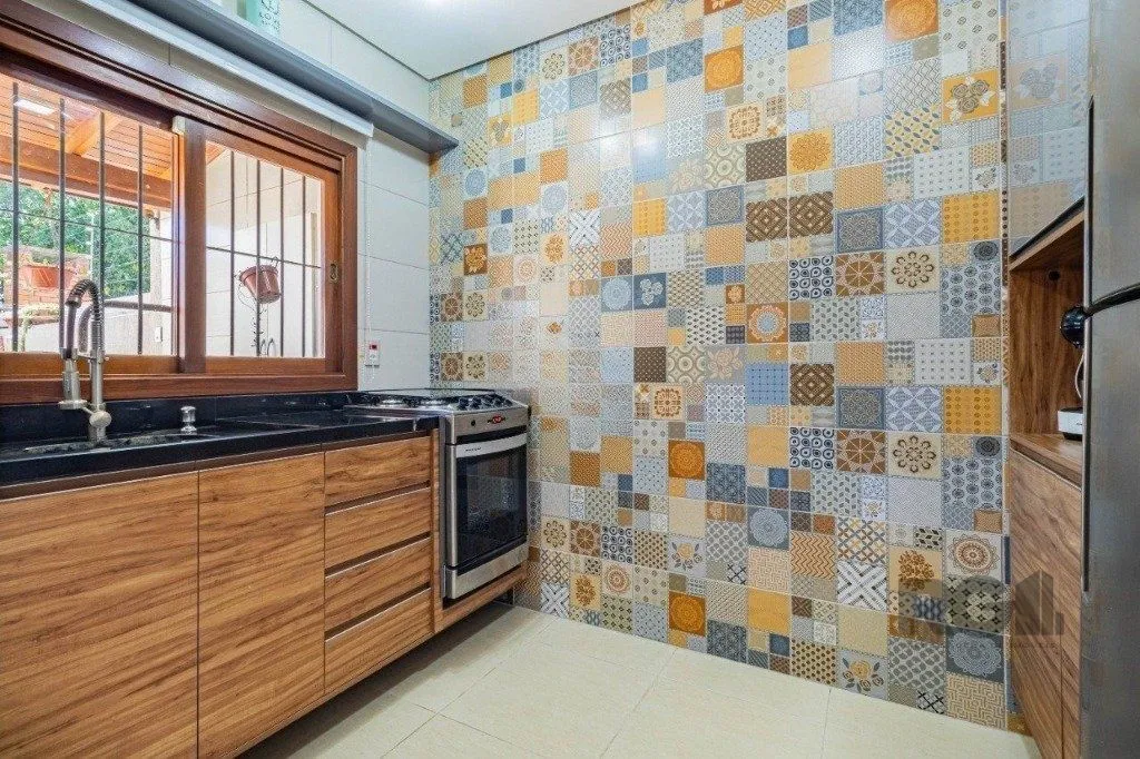 Imagem Casa de 3 dormitórios no bairro Cavalhada