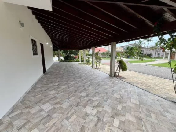 Imagem Sobrado à venda em Peruíbe/SP Condomínio Bougainville II Porteira fechada