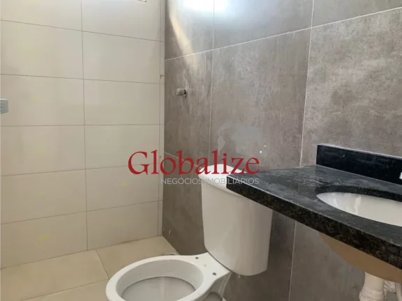 Imagem Casa sobreposta alta à venda com 72m², 2 quartos, 1 suíte, churrasqueira por R$315.000,00 em Santos