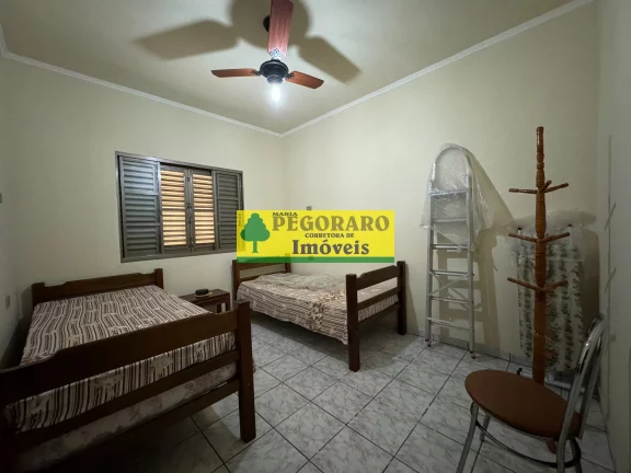 Imagem Casa à venda em Caraguatatuba-SP, bairro Caputera: 3 quartos, 2 suítes, 2 salas, 4 banheiros, 4 vagas de garagem. Venha conferir!
