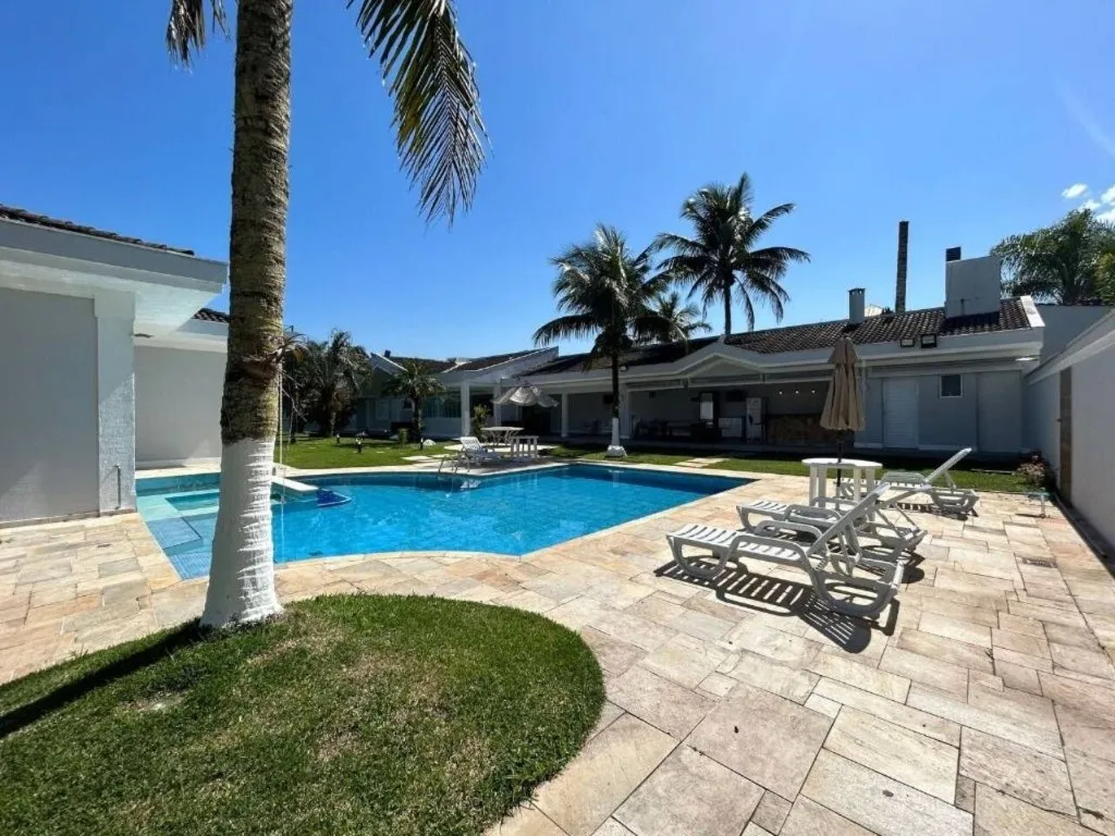 Imagem Alugar casa em condomínio em Jardim Acapulco Guarujá SP, casa á venda em Guarujá SP