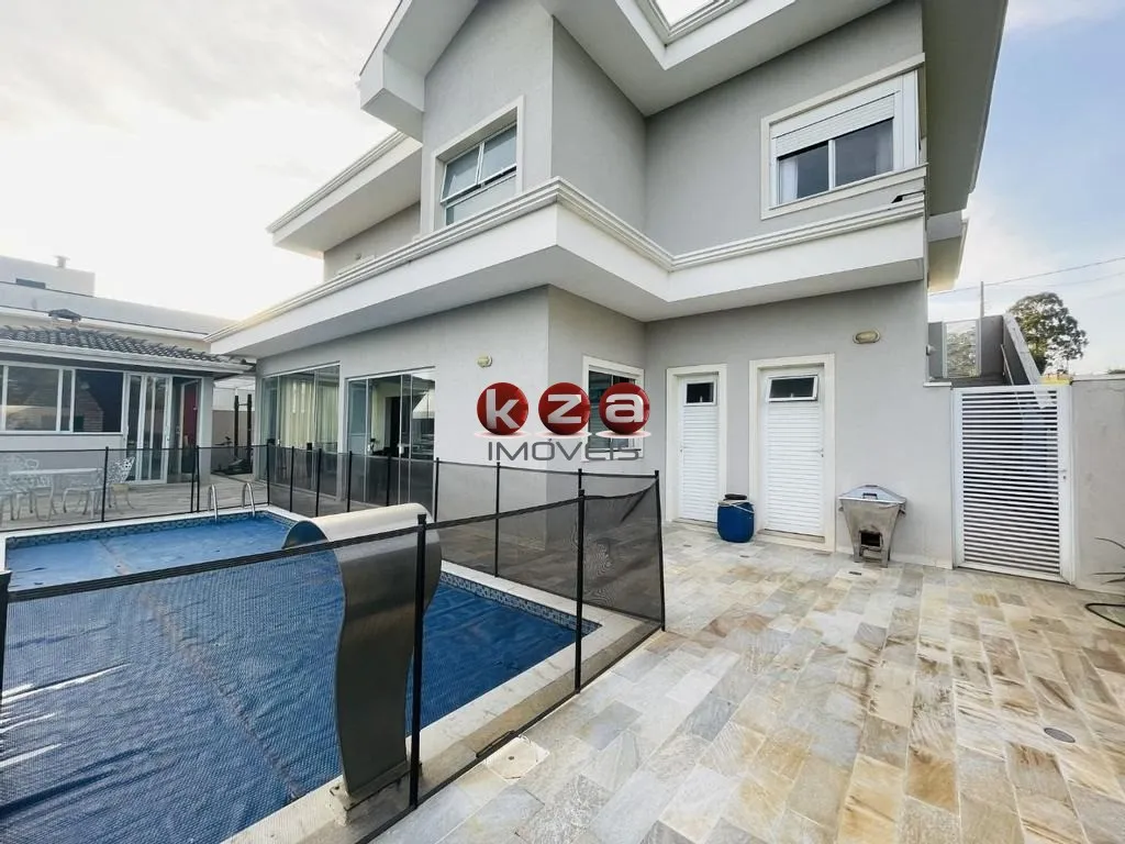 Imagem Casa de luxo no Condomínio Terras de Santa Teresa em Vinhedo, com 4 suítes, 3 salas e 350m² de área privativa. Venha conferir!