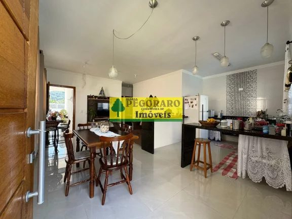Imagem Ótima Casa à Venda na Martim de Sá em Caraguatatuba-SP - 3 quartos, 1 suite, 2 salas, 3 banheiros, 2 vagas, 102m²!
