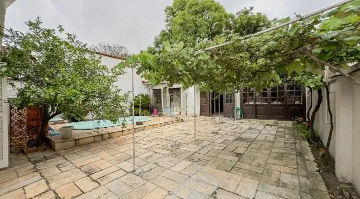 Imagem Casa de 3 dormitórios, 1 suíte e 3 vagas de garagem, bairro Ipanema.