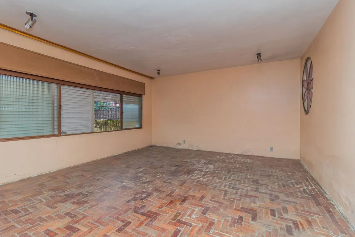 Imagem Casa de 4 dormitorios à venda Avenida Tramandaí, Ipanema - Porto Alegre