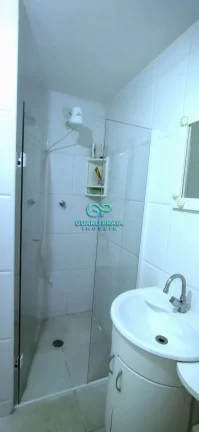 Imagem 2 dormitórios, 2 banheiros, sala para 2 ambientes, cozinha, área de serviço, 1 vaga de garagem