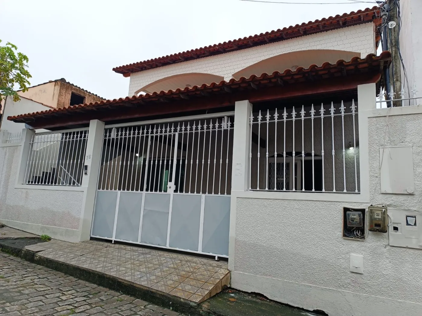 Imagem Casa em Condomínio para Venda em Itaboraí, Centro (Manilha), 4 dormitórios, 1 suíte, 2 banheiros, 1 vaga