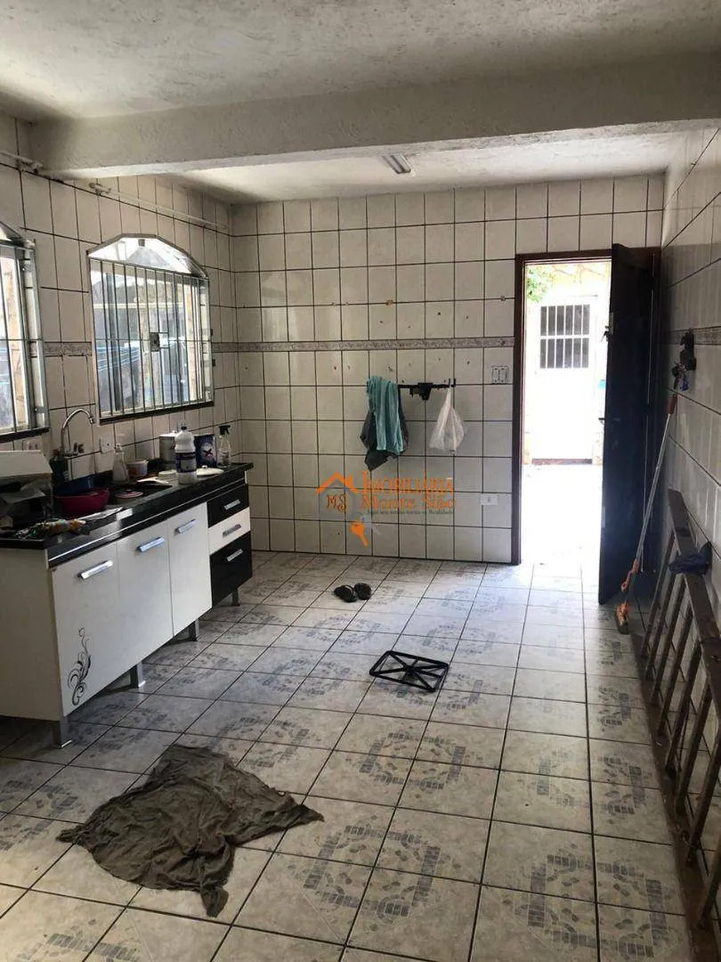 Imagem Casa com 3 dormitórios à venda, 377 m² por R$ 693.000,00 - Taboão - Guarulhos/SP