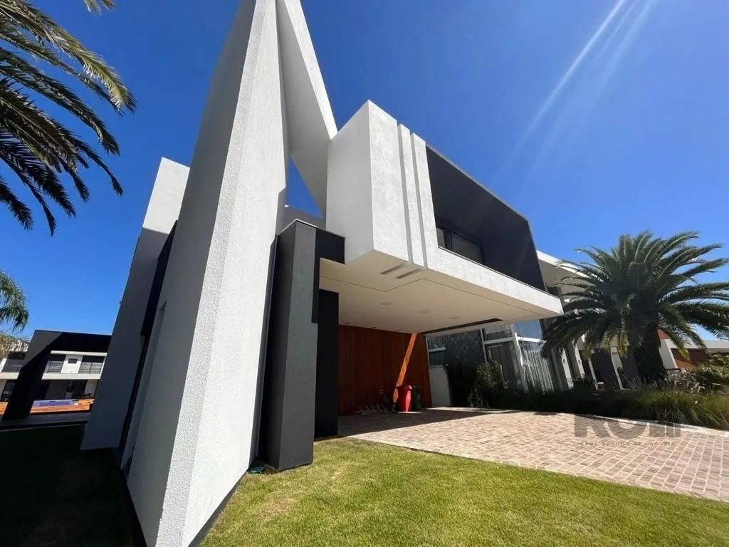Imagem Casa de Condomínio em Atlântida Sul