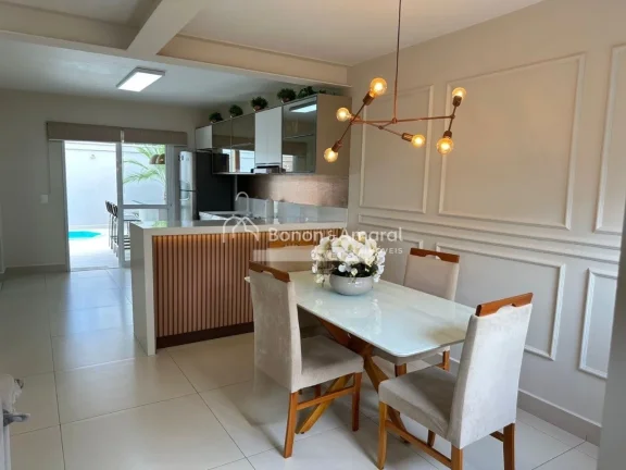 Imagem Encante-se com esta charmosa casa localizada em um condomínio de arquitetura moderna e aconchegante...
