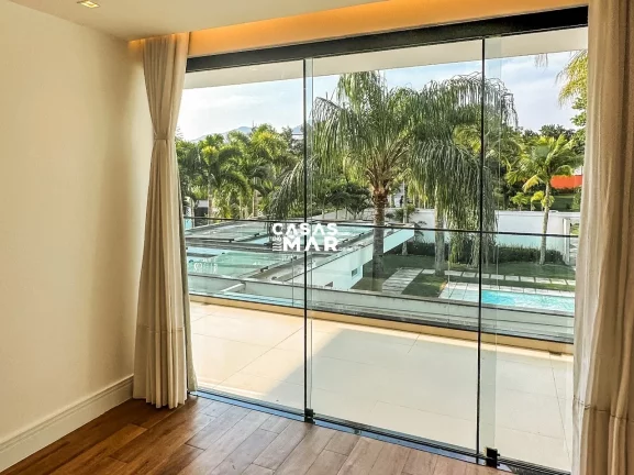 Imagem Imponente residência de luxo com 4 suítes na Barra da Tijúca, Rio de Janeiro - RJ: 3 salas, 6 vagas e 1.000m² de puro requinte!