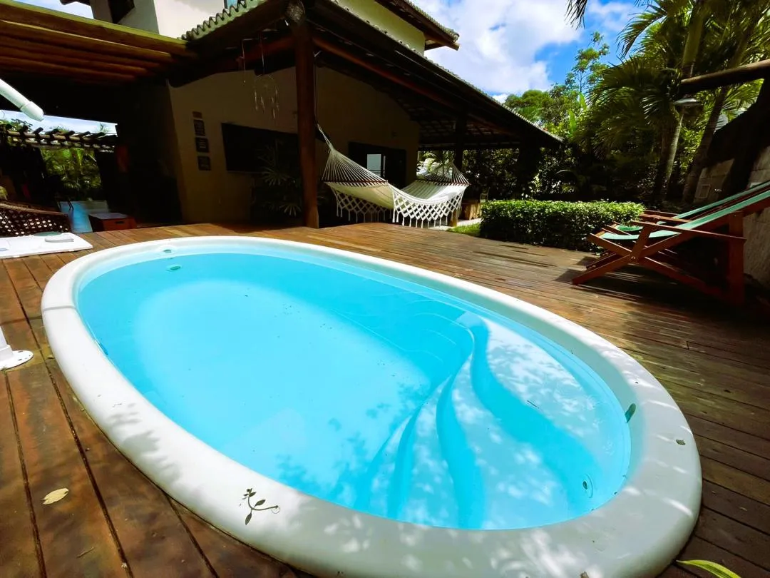 Imagem Casa à venda em Condomínio com piscina na Lagoa Aruá Praia do Forte Bahia