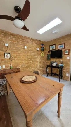 Imagem Excelente casa duplex em condomínio fechado com três suítes e área gourmet a venda em Stella Maris Salvador