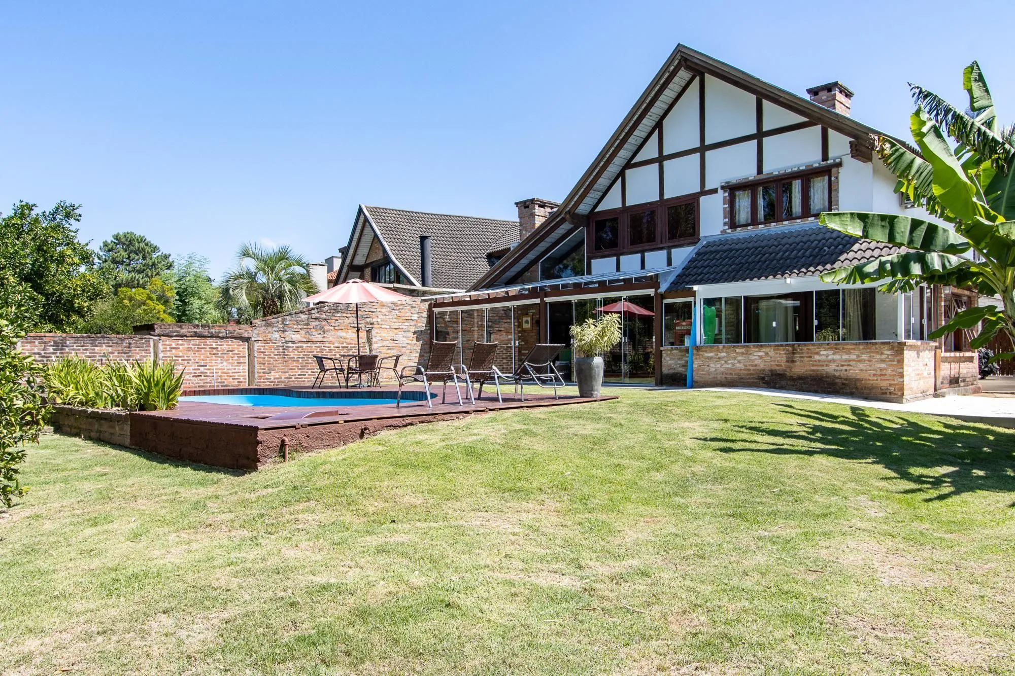 Imagem Casa 4 suites no Terra Ville, com home office, estar íntimo, 4 vagas e piscina.