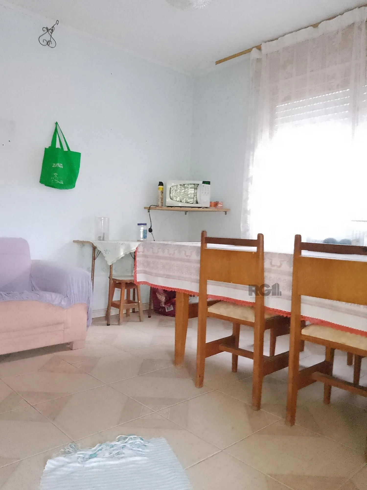 Imagem Casa 4 dormitórios, terreno com 1639m² à venda no Morro Santana