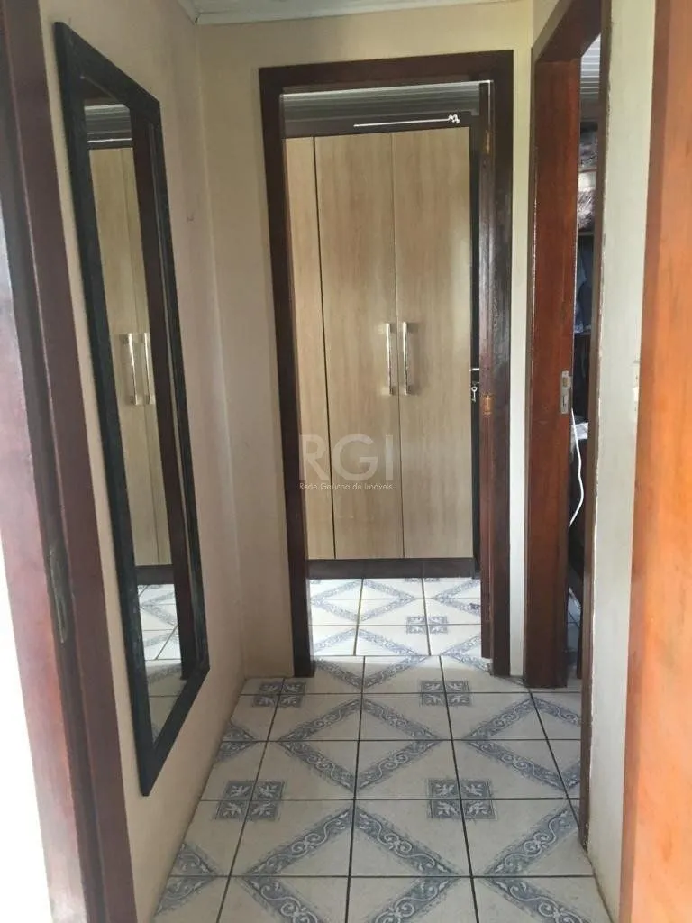 Imagem Sobrado para Venda - 92m², 3 dormitórios, 2 vagas - Restinga Nova