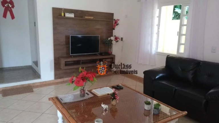 Imagem Sobrado com 2 dormitórios à venda, 180 m² por R$ 590.000,00 - Balneario Praia do Perequê - Guarujá/SP