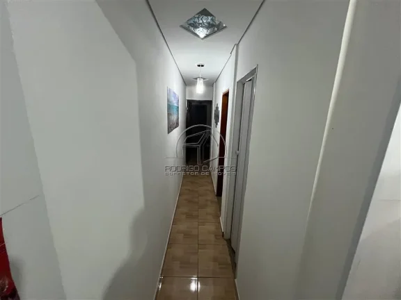Imagem Casa Geminada Térrea com Piscina e 3 Quartos no Tupi, Praia Grande