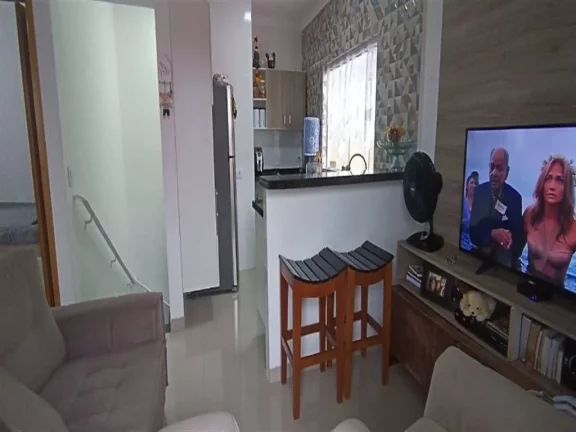 Imagem Casa com 2 dormitórios à venda, 63 m² por R$ 410.000,00 - Mirim - Praia Grande/SP