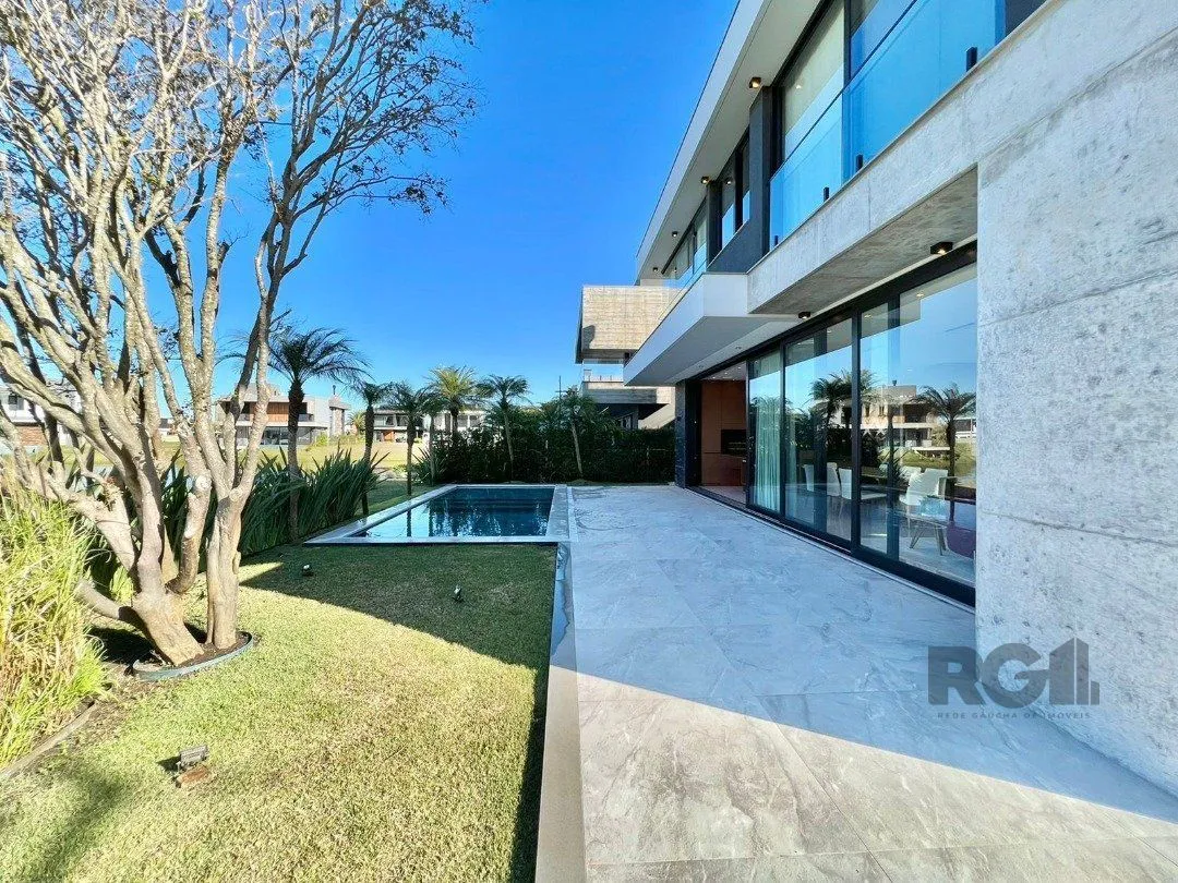 Imagem Casa de Condomínio em Atlântida Sul
