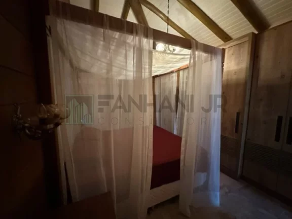 Imagem Deslumbre-se com esta incrível oportunidade de adquirir uma casa dos sonhos no exclusivo condomínio Yacamim, localizado em Ilhabela. Com uma vista esp