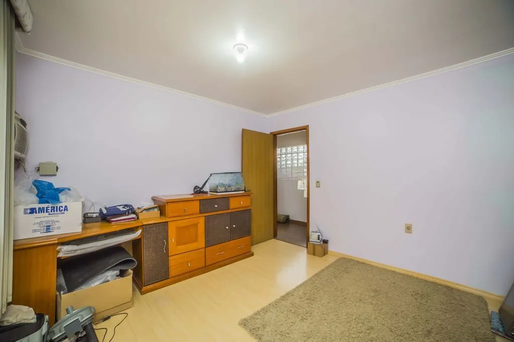 Imagem Casa de 4 dormitórios à venda no Bairro Santa Tereza - Porto Alegre