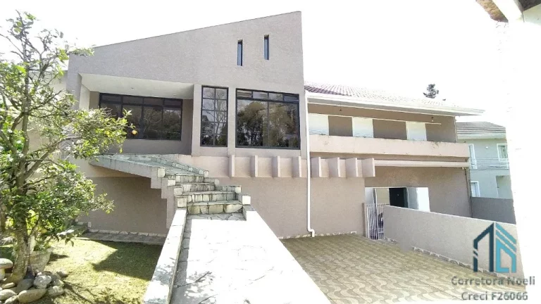 Imagem Casa, 04 quartos c/suíte, 02 subsolos tipo bunker, com 05 ambientes subterrâneos amplos, ideal para adega e estúdio, em Curitiba PR