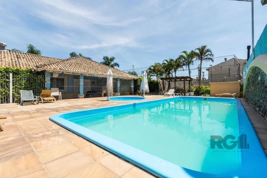 Imagem Casa em condomínio fechado - 70m², 2 dormitórios, 1 vaga de garagem no bairro Humaitá