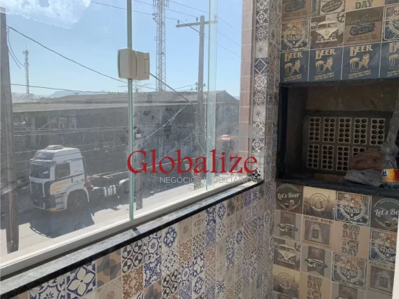 Imagem Casa sobreposta alta à venda com 72m², 2 quartos, 1 suíte, churrasqueira por R$315.000,00 em Santos