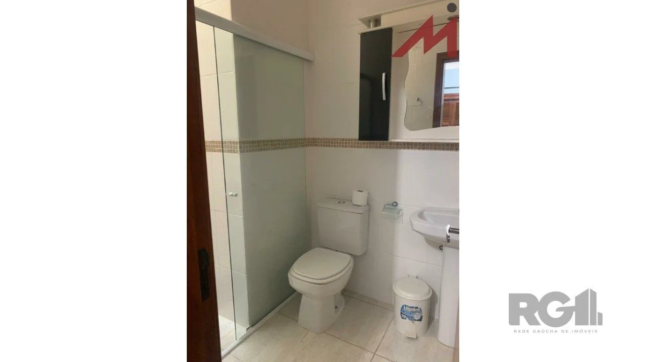 Imagem Sobrado em Trmandai com 2 suirtes, 2 banheiros, 1 vaga, churrasqueira e varanda.