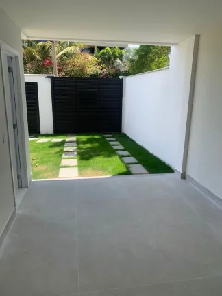 Imagem Casa Triplex com 3 quartos sendo uma suíte duas vagas de garagem área gourmet na Enseada Azul
