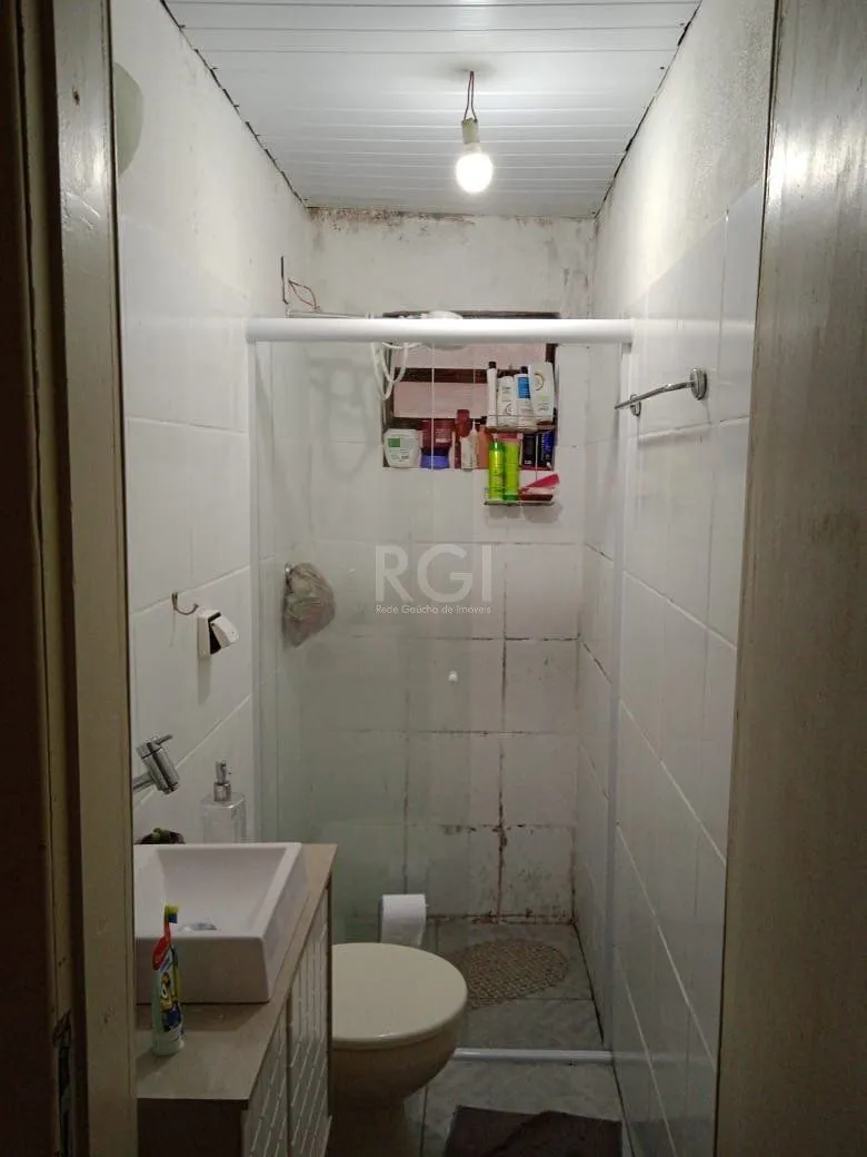Imagem Casa para Venda - 140m², 5 dormitórios, 2 vagas - Cavalhada, Porto Alegre