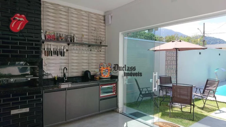 Imagem Casa com 3 dormitórios à venda, 107 m² por R$ 890.000,00 - Massaguaçu - Caraguatatuba/SP