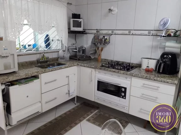 Imagem Sobrado com 3 dormitórios à venda, 158 m², Guilhermina Esperança, São Paulo - SP
