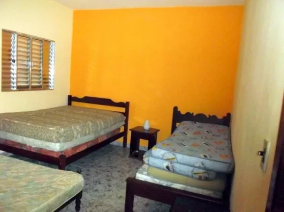 Imagem casa lado praia- tres dormitorios