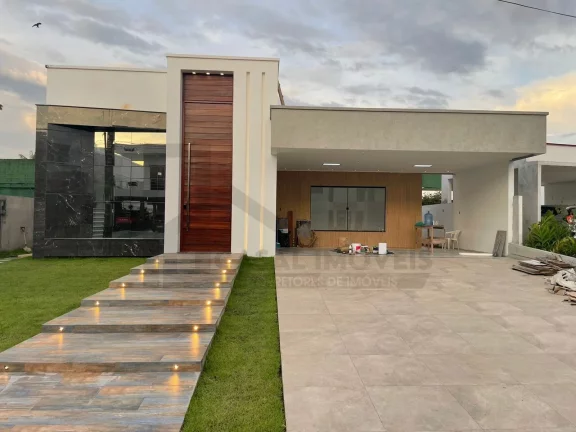 Imagem CASAL IMÓVEIS VENDE CASA TERREA MONTENEGRO BOULEVARD 3 SUÍTES + 6 VGS + PISCINA PRIVATIVA