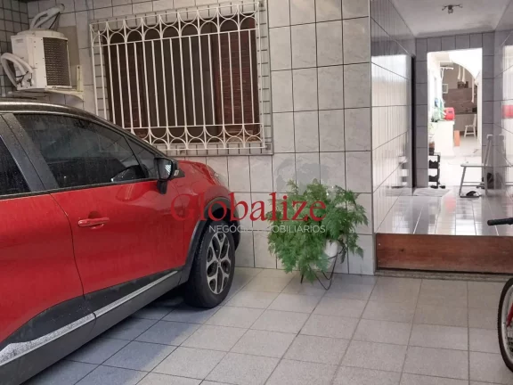 Imagem Casa térrea à venda com 125m², 2 quartos, churrasqueira, área coberta, vaga de garagem coberta por R$390.000,00 em Santos