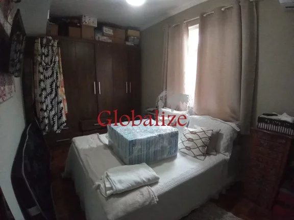 Imagem Casa em Vila à venda com 2 quartos, 2 banheiros, churrasqueira na Vila Mathias em Santos por R$426.000,00