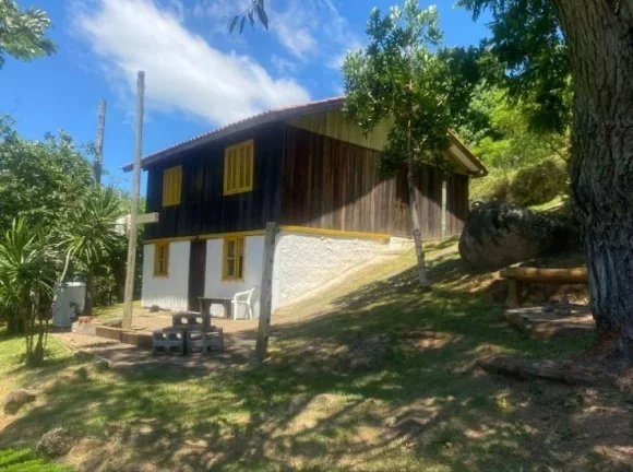 Foto do imóvel Casa com Vista Deslumbrante à Venda no Bairro Macacu - Garopaba-SC!