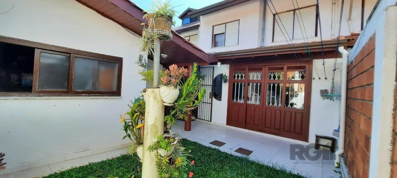 Imagem Casa Condominio para Venda - 129.58m², 3 dormitórios, sendo 1 suites, 3 vagas - Cavalhada