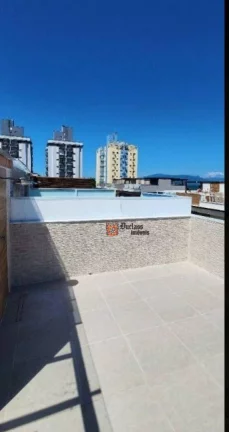 Imagem Sobrado triplex com 2 suítes à venda, 199 m² por R$ 675.000 - Massaguaçu - Caraguatatuba/SP