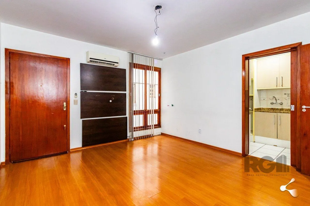 Imagem Apartamento com 2 dormitórios e 1 vaga de garagem escriturada bairro Rio Branco