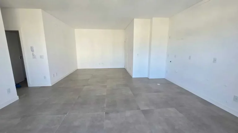 Imagem Apartamento vista mar com 3 suítes e 2 vagas de garagem na Praia Brava