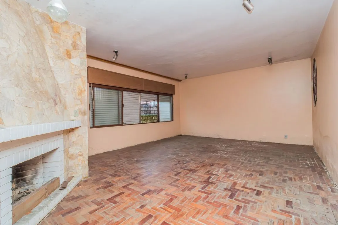 Imagem Casa de 4 dormitorios à venda Avenida Tramandaí, Ipanema - Porto Alegre