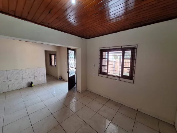 Imagem Casa com 91m², dois dormitórios, garagem, Lomba Tarumã, Viamão/RS.