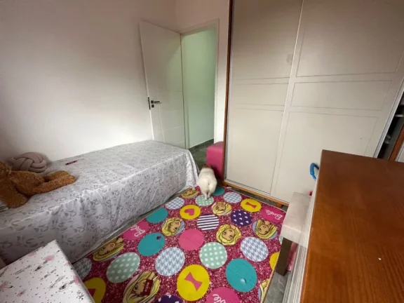 Imagem SOBRADO COM VISTA PARA O MAR à venda no Caiçara em Praia Grande-SP, com 2 dormitórios, sala, cozinha americana, banheiro social, lavabo, 2 vagas de garagem, moveis planejados, churrasqueira, 70 metros da praia. Estuda parcelamento direto.