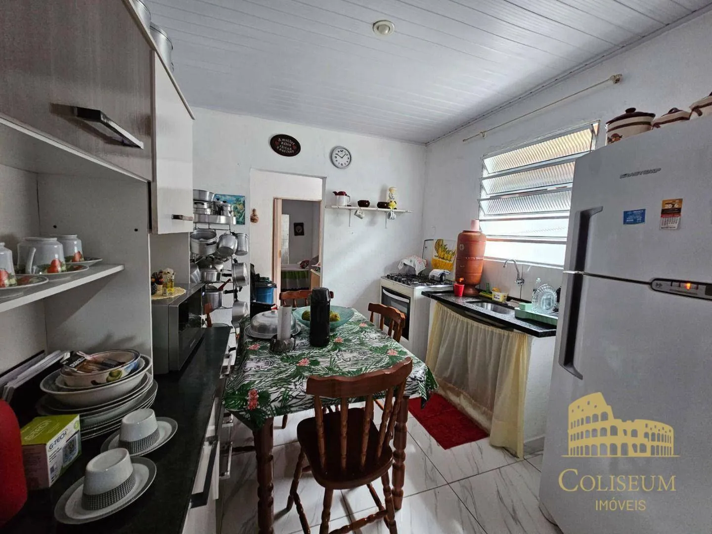 Imagem Casa com 2 dormitórios à venda, 93 m² por R$ 330.000,00 - Vila Antártica - Praia Grande/SP