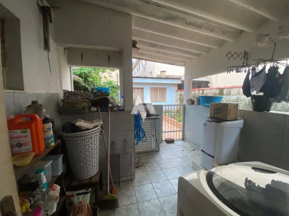 Imagem Casa à venda com 3 dormitórios e edícula no bairro Aparecida de Santos/SP